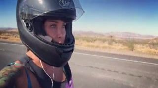 felicity feline motorcycle stunner riding aprilia in bra