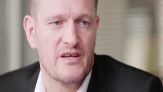 business woman swallows while working