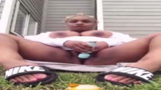 voluptuous exotic trinidadian fucktoy with colossal titts plays with herself outside her apartment complex as onlookers walk by